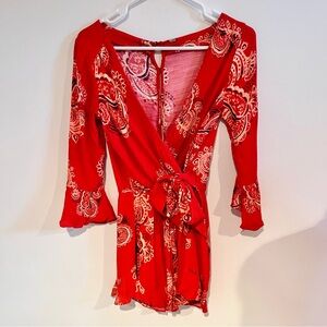 Free People “All the Right Ruffles” Romper